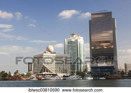 "Modern architecture at Dubai Creek, Dubai Creek Tower, National Bank of Dubai, Deira, Dubai, United Arab Emirates, Asia" View Large Photo Image Stock Image - "Modern architecture at Dubai Creek, Dubai Creek Tower, National Bank of Dubai, Deira, Dubai, United Arab Emirates, Asia". Fotosearch