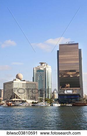 "Modern architecture at Dubai Creek, Dubai Creek Tower, National Bank of Dubai, Deira, Dubai, United Arab Emirates, Asia" View Large Photo Image Stock Image - "Modern architecture at Dubai Creek, Dubai Creek Tower, National Bank of Dubai, Deira, Dubai, United Arab Emirates, Asia". Fotosearch