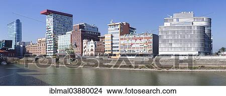 "Modern architecture at the trade port, Media Harbour, Dusseldorf, North Rhine-Westphalia, Germany, Europe" View Large Photo Image Picture - "Modern architecture at the trade port, Media Harbour, Dusseldorf, North Rhine-Westphalia, Germany, Europe". Fotosearch