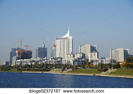 Stock Photo - "Modern architecture with the Neue Donau high-rise building on the New Danube River, Vienna, Austria, Europe". Fotosearch
