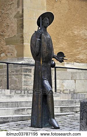 "Modern bronze statue of Saint James as a guide for pilgrims, St. James's Church, Rothenburg ob der Tauber, Middle Franconia, Bavaria, Germany, Europe" View Large Photo Image Stock Photography - "Modern bronze statue of Saint James as a guide for pilgrims, St. James's Church, Rothenburg ob der Tauber, Middle Franconia, Bavaria, Germany, Europe". Fotosearch