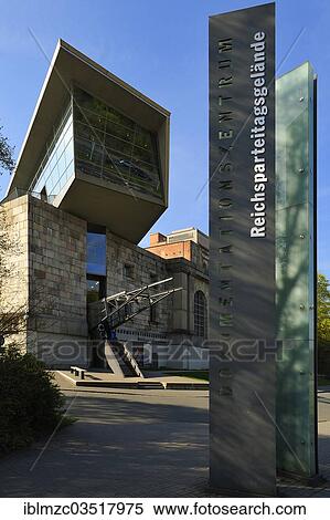 "Modern entrance to the Documentation Centre, Nazi Party Rally Grounds 1933-1945, former Congress Hall of the NSDAP, museum sign on the right, Nuremberg, Middle Franconia, Bavaria, Germany, Europe" View Large Photo Image Stock Photography - "Modern entrance to the Documentation Centre, Nazi Party Rally Grounds 1933-1945, former Congress Hall of the NSDAP, museum sign on the right, Nuremberg, Middle Franconia, Bavaria, Germany, Europe". Fotosearch
