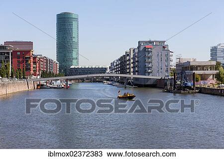 "Modern luxury apartments at Westhafen harbour with a private jetty and views of Westhafen Tower, Westhafenplatz square, Frankfurt am Main, Hesse, Germany, Europe, PublicGround, Europe" View Large Photo Image Stock Image - "Modern luxury apartments at Westhafen harbour with a private jetty and views of Westhafen Tower, Westhafenplatz square, Frankfurt am Main, Hesse, Germany, Europe, PublicGround, Europe". Fotosearch