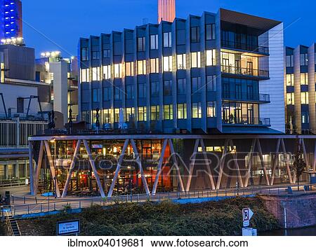 "Modern Restaurant Chicago Meat Packers Riverside with modern office buildings, Westhafen Pier 1, Frankfurt am Main, Hesse, Germany, Europe" View Large Photo Image Stock Image - "Modern Restaurant Chicago Meat Packers Riverside with modern office buildings, Westhafen Pier 1, Frankfurt am Main, Hesse, Germany, Europe". Fotosearch