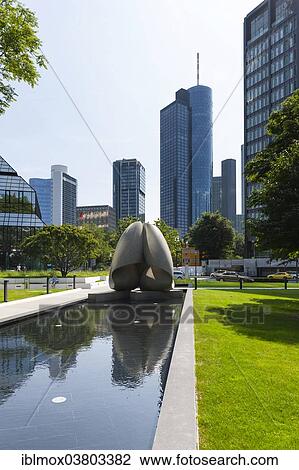 "Modern sculpture, Hessian State Bank at the back, Frankfurt, Hesse, Germany, Europe" View Large Photo Image Stock Image - "Modern sculpture, Hessian State Bank at the back, Frankfurt, Hesse, Germany, Europe". Fotosearch