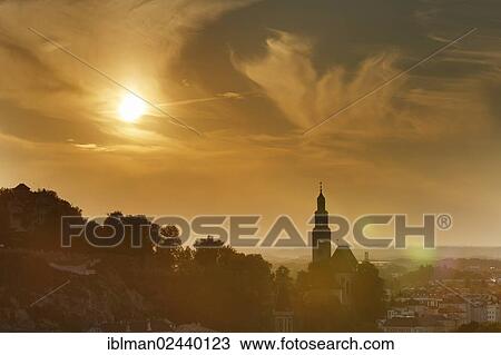 "Moenchsberg mountain and Augustinerkirche church in Muelln in the evening light, as seen from Kapuzinerberg mountain, Salzburg, Austria, Europe" View Large Photo Image Stock Image - "Moenchsberg mountain and Augustinerkirche church in Muelln in the evening light, as seen from Kapuzinerberg mountain, Salzburg, Austria, Europe". Fotosearch