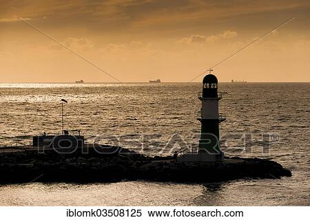 "Mole with lighthouse, Warnemunde, Rostock, Mecklenburg-Western Pomerania, Germany, Europe" View Large Photo Image Stock Photography - "Mole with lighthouse, Warnemunde, Rostock, Mecklenburg-Western Pomerania, Germany, Europe". Fotosearch