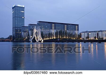 "Molecule Man, artwork by American sculptor Jonathan Borofsky, and Treptowers building complex on the River Spree, Treptow, Berlin, Germany, Europe" View Large Photo Image Stock Image - "Molecule Man, artwork by American sculptor Jonathan Borofsky, and Treptowers building complex on the River Spree, Treptow, Berlin, Germany, Europe". Fotosearch