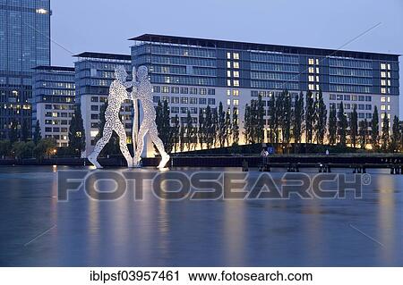 "Molecule Man, artwork by American sculptor Jonathan Borofsky, and Treptowers building complex on the River Spree, Treptow, Berlin, Germany, Europe" View Large Photo Image Stock Image - "Molecule Man, artwork by American sculptor Jonathan Borofsky, and Treptowers building complex on the River Spree, Treptow, Berlin, Germany, Europe". Fotosearch