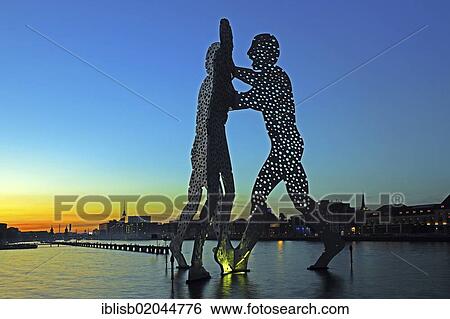 "Molecule Men, 30 metre high artwork made of aluminium, sculpted by Jonathan Borofsky, standing in the Spree River, at sunset, Berlin, Germany, Europe, PublicGround, Europe" View Large Photo Image Stock Photograph - "Molecule Men, 30 metre high artwork made of aluminium, sculpted by Jonathan Borofsky, standing in the Spree River, at sunset, Berlin, Germany, Europe, PublicGround, Europe". Fotosearch