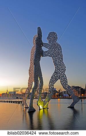 "Molecule Men, 30 metre high work of art made of aluminum, sculptor Jonathan Borofsky, standing in the Spree River at sunset, Berlin, Germany, Europe, PublicGround, Europe" View Large Photo Image Picture - "Molecule Men, 30 metre high work of art made of aluminum, sculptor Jonathan Borofsky, standing in the Spree River at sunset, Berlin, Germany, Europe, PublicGround, Europe". Fotosearch