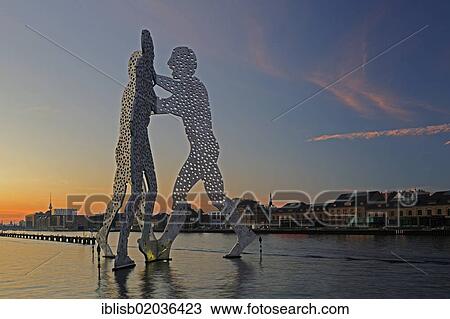 "Molecule Men, 30 metre high work of art made of aluminum, sculptor Jonathan Borofsky, standing in the Spree River at sunset, Berlin, Germany, Europe, PublicGround, Europe" View Large Photo Image Stock Image - "Molecule Men, 30 metre high work of art made of aluminum, sculptor Jonathan Borofsky, standing in the Spree River at sunset, Berlin, Germany, Europe, PublicGround, Europe". Fotosearch