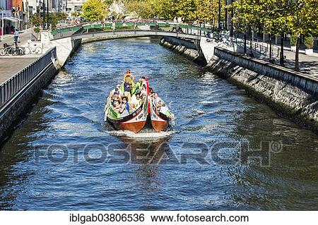 Stock Photograph - "Moliceiro boat travelling on the Central Channel, Aveiro, Centro region, Portugal, Europe". Fotosearch