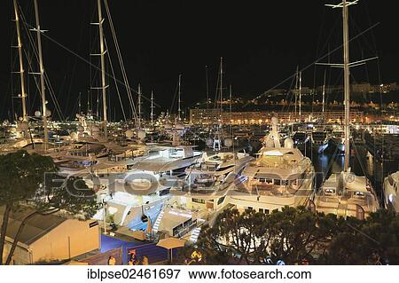Stock Photo - "Monaco Yacht Show 2012, Port Hercule, at night, Principality of Monaco, Cote d'Azur, Mediterranean Sea, Europe". Fotosearch