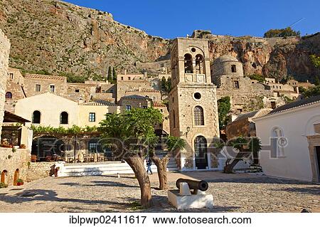 Monemvasia, main square of the lower town with the bell tower of the Byzantine Greek Orthodox Church of Christ Elkomenos, Peloponnese, Greece, Europe View Large Photo Image Stock Photo - Monemvasia, main square of the lower town with the bell tower of the Byzantine Greek Orthodox Church of Christ Elkomenos, Peloponnese, Greece, Europe. Fotosearch