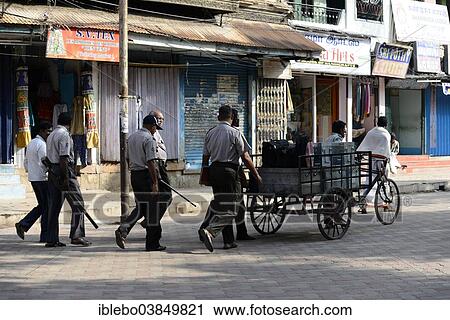 "Money transport with armed escorts, Madurai, Tamil Nadu, South India, India, Asia" View Large Photo Image Stock Image - "Money transport with armed escorts, Madurai, Tamil Nadu, South India, India, Asia". Fotosearch