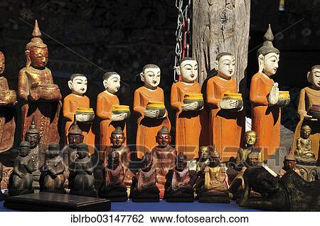 "Monk figures and Buddha figures at a market, Phaung Daw U, Inle-See, Shan State, Myanmar, Burma, Asia" View Large Photo Image Stock Image - "Monk figures and Buddha figures at a market, Phaung Daw U, Inle-See, Shan State, Myanmar, Burma, Asia". Fotosearch