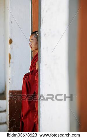 "Monk in a courtyard of Punakha Dzong fortress, Punakha, Punakha district, Bhutan, Asia" View Large Photo Image Stock Image - "Monk in a courtyard of Punakha Dzong fortress, Punakha, Punakha district, Bhutan, Asia". Fotosearch