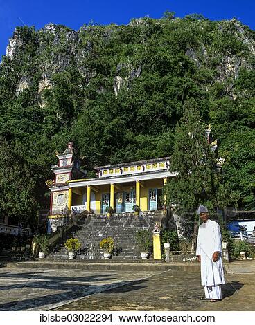 "Monk in front of An Quang Pagoda in the Marble Mountains, Da Nang, Zentralvietnam, Vietnam, Asia" View Large Photo Image Picture - "Monk in front of An Quang Pagoda in the Marble Mountains, Da Nang, Zentralvietnam, Vietnam, Asia". Fotosearch