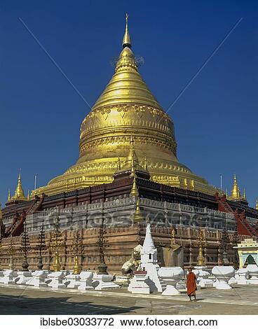 "Monk in front of Shwezigon Pagoda, Golden Chedi, Nyaung U, Ebene von Pagan, Bagan, Mandalay Division, Myanmar, Burma, Asia" View Large Photo Image Stock Image - "Monk in front of Shwezigon Pagoda, Golden Chedi, Nyaung U, Ebene von Pagan, Bagan, Mandalay Division, Myanmar, Burma, Asia". Fotosearch