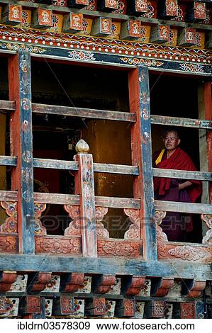 Stock Photo - "Monk in the monastery area of â€‹â€‹Trongsa Dzong fortress, Trongsa, Trongsa District, Bhutan, Asia". Fotosearch