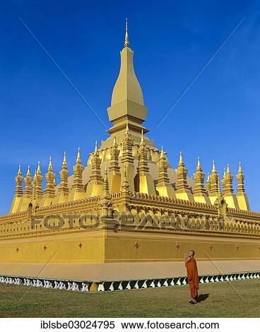 "Monk praying in front of Phra That Luang, Golden Stupa, Vientiane, Vientiane Province, Laos, Asia" View Large Photo Image Stock Photography - "Monk praying in front of Phra That Luang, Golden Stupa, Vientiane, Vientiane Province, Laos, Asia". Fotosearch