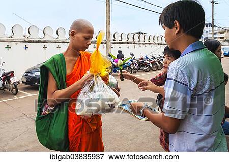 "Monk receiving alms, Ayutthaya, Thailand, Asia" View Large Photo Image Stock Photo - "Monk receiving alms, Ayutthaya, Thailand, Asia". Fotosearch