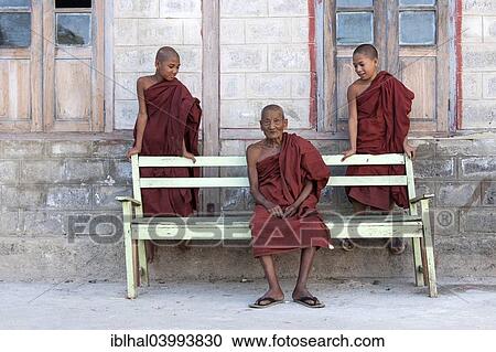 "Monk with two novice monks at the Shwe Yaunghwe Kyaung Monastery, near Nyaungshwe, Shan State, Inle Lake, Myanmar, Asia" View Large Photo Image Stock Image - "Monk with two novice monks at the Shwe Yaunghwe Kyaung Monastery, near Nyaungshwe, Shan State, Inle Lake, Myanmar, Asia". Fotosearch