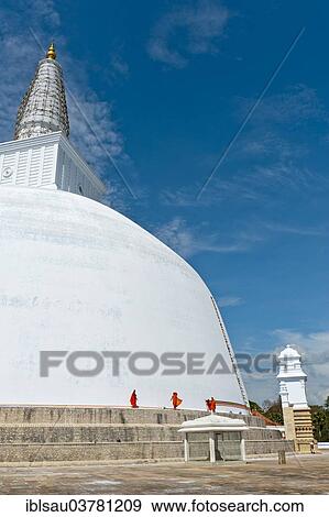 "Monks at a large white stupa, Ruwanwelisaya Dagoba, Anuradhapura, Sri Lanka, Asia" View Large Photo Image Stock Photo - "Monks at a large white stupa, Ruwanwelisaya Dagoba, Anuradhapura, Sri Lanka, Asia". Fotosearch