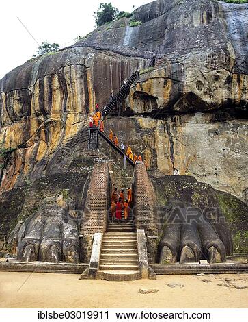 "Monks at the Lion Staircase of the Rock of Sigiriya, Lion Rock, column of rock of an eroded volcano, UNESCO World Heritage Site, Sigiriya, Sigirija, Zentralprovinz, Sri Lanka, Asia" View Large Photo Image Stock Image - "Monks at the Lion Staircase of the Rock of Sigiriya, Lion Rock, column of rock of an eroded volcano, UNESCO World Heritage Site, Sigiriya, Sigirija, Zentralprovinz, Sri Lanka, Asia". Fotosearch