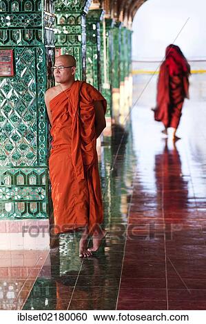 "Monks between columns at the Two Snake Pagoda on Mandalay Hill in Mandalay, Myanmar, Burma, Southeast Asia, Asia" View Large Photo Image Stock Image - "Monks between columns at the Two Snake Pagoda on Mandalay Hill in Mandalay, Myanmar, Burma, Southeast Asia, Asia". Fotosearch