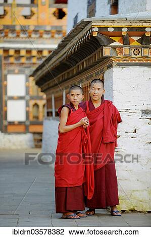Stock Image - "Monks in Mongar Dzong fortress, Mongar, Mongar District, Bhutan, Asia". Fotosearch