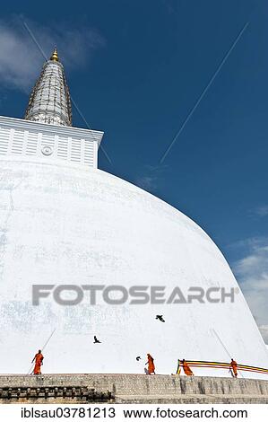 "Monks tying a cloth around a large white stupa, Ruwanwelisaya Dagoba, Anuradhapura, Sri Lanka, Asia" View Large Photo Image Stock Image - "Monks tying a cloth around a large white stupa, Ruwanwelisaya Dagoba, Anuradhapura, Sri Lanka, Asia". Fotosearch