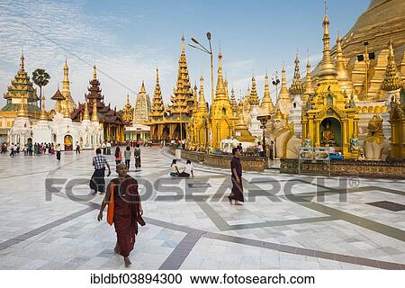 "Monks, worshipers and visitors, shrines, stupas, chedis, Shwedagon Pagoda, Singuttara Hill, Yangon, Yangon Region, Myanmar, Asia" View Large Photo Image Stock Image - "Monks, worshipers and visitors, shrines, stupas, chedis, Shwedagon Pagoda, Singuttara Hill, Yangon, Yangon Region, Myanmar, Asia". Fotosearch
