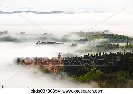 "Monte Oliveto Maggiore abbey with mist-shrouded valleys, Chiusure, Tuscany, Italy, Europe" View Large Photo Image Picture - "Monte Oliveto Maggiore abbey with mist-shrouded valleys, Chiusure, Tuscany, Italy, Europe". Fotosearch