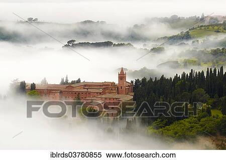 "Monte Oliveto Maggiore abbey with mist-shrouded valleys, Chiusure, Tuscany, Italy, Europe" View Large Photo Image Stock Photography - "Monte Oliveto Maggiore abbey with mist-shrouded valleys, Chiusure, Tuscany, Italy, Europe". Fotosearch