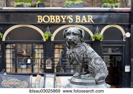 "Monument to a dog, Greyfriars Bobby, in front of Bobby's Bar, Lothian, Edinburgh, Scotland, United Kingdom, Europe" View Large Photo Image Stock Photo - "Monument to a dog, Greyfriars Bobby, in front of Bobby's Bar, Lothian, Edinburgh, Scotland, United Kingdom, Europe". Fotosearch