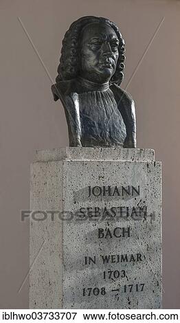 Stock Photo - "Monument to Johann Sebastian Bach, bronze bust on a stone plinth with an inscription, Weimar, Thuringia, Germany, Europe". Fotosearch