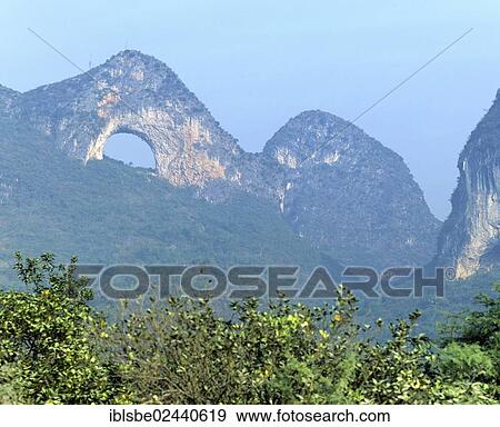 "Moon Mountain near Yangshuo, Guilin, Guangxi, China, Asia" View Large Photo Image Stock Photo - "Moon Mountain near Yangshuo, Guilin, Guangxi, China, Asia". Fotosearch