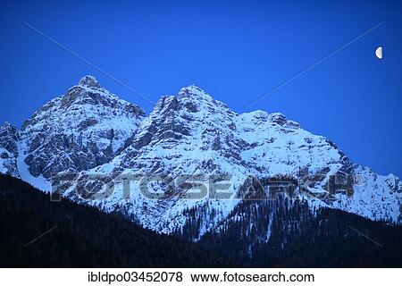 "Moon over Serles mountain or Waldrastspitze mountain, Stubai Alps, Tyrol, Austria, Europe" View Large Photo Image Stock Photo - "Moon over Serles mountain or Waldrastspitze mountain, Stubai Alps, Tyrol, Austria, Europe". Fotosearch