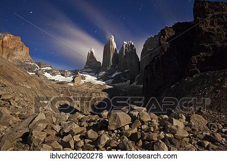 Stock Photo - "Moonlight over the Torres del Paine mountain group, Torres del Paine National Park, Patagonia region, Chile, South America". Fotosearch