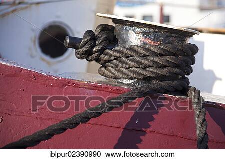 "Moored securely, detail view of a small sailing ship in the harbour of Greifswald, Mecklenburg-Western Pomerania, Germany, Europe" View Large Photo Image Stock Image - "Moored securely, detail view of a small sailing ship in the harbour of Greifswald, Mecklenburg-Western Pomerania, Germany, Europe". Fotosearch