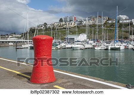 "Mooring bollard and yachts in harbour, Torquay, Devon, England, United Kingdom, Europe" View Large Photo Image Stock Image - "Mooring bollard and yachts in harbour, Torquay, Devon, England, United Kingdom, Europe". Fotosearch