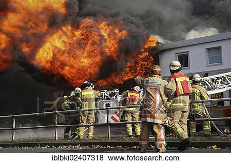 "More than 140 firefighters extinguishing a burning carpet warehouse in Berlin-Reinickendorf, Berlin, Germany, Europe" View Large Photo Image Stock Photo - "More than 140 firefighters extinguishing a burning carpet warehouse in Berlin-Reinickendorf, Berlin, Germany, Europe". Fotosearch