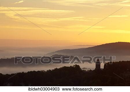 "Morning fog above the Thuringian Forest, monument to the student fraternities, view from Wartburg Castle, Thuringer Wald, Eisenach, Thuringia, Germany, Europe" View Large Photo Image Stock Image - "Morning fog above the Thuringian Forest, monument to the student fraternities, view from Wartburg Castle, Thuringer Wald, Eisenach, Thuringia, Germany, Europe". Fotosearch