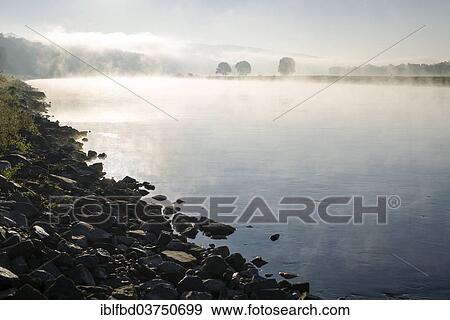 Stock Photo - "Morning fog on the Elbe river, Dresden, Saxony, Germany, Europe". Fotosearch