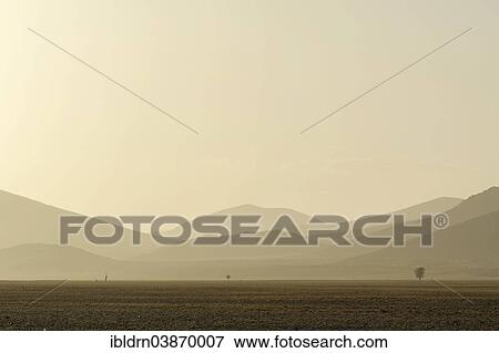 "Morning haze over the landscape of the Namib Desert, Sesriem, Hardap Region, Namibia, Africa" View Large Photo Image Stock Photo - "Morning haze over the landscape of the Namib Desert, Sesriem, Hardap Region, Namibia, Africa". Fotosearch