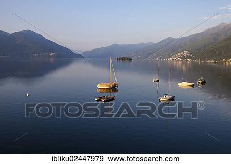 "Morning mood and boats in front of the Brissago Islands, view from Casa Moscia, Ascona, lake Lago Maggiore, Ticino, Switzerland, Europe" View Large Photo Image Stock Photo - "Morning mood and boats in front of the Brissago Islands, view from Casa Moscia, Ascona, lake Lago Maggiore, Ticino, Switzerland, Europe". Fotosearch
