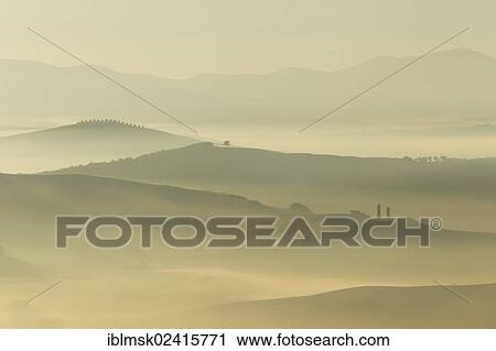 Stock Image - Morning mood, hilly landscape in autumn, San Qurico d'Orcia, UNESCO World Cultural Heritage Site, Tuscany region, province of Siena, Italy, Europe. Fotosearch