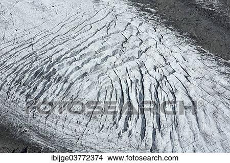 Picture - "Morteratsch Glacier or Vadret da Morteratsch on Munt Pers Mountain, Canton of Grisons, Switzerland, Europe". Fotosearch